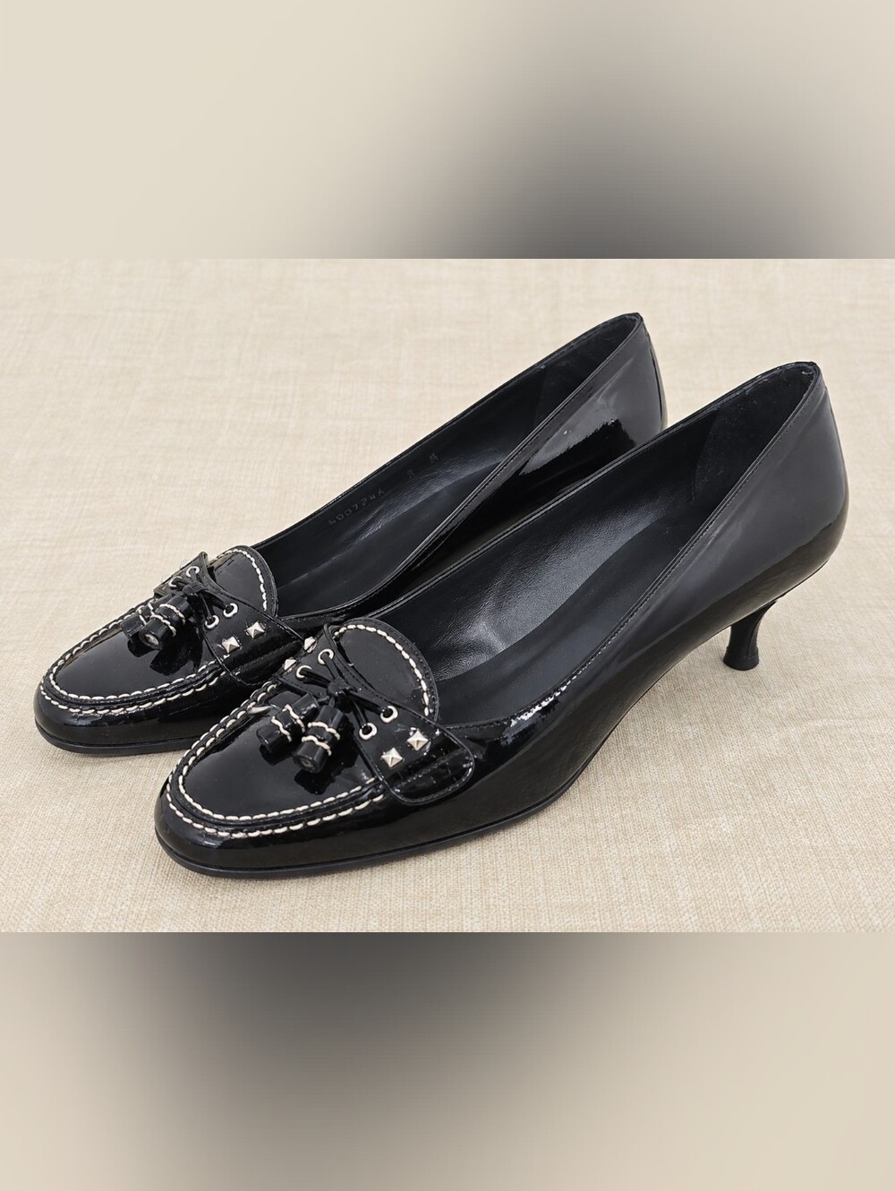 Stuart Weitzman black patent leather pumps in women's size 8. Made in Spain.